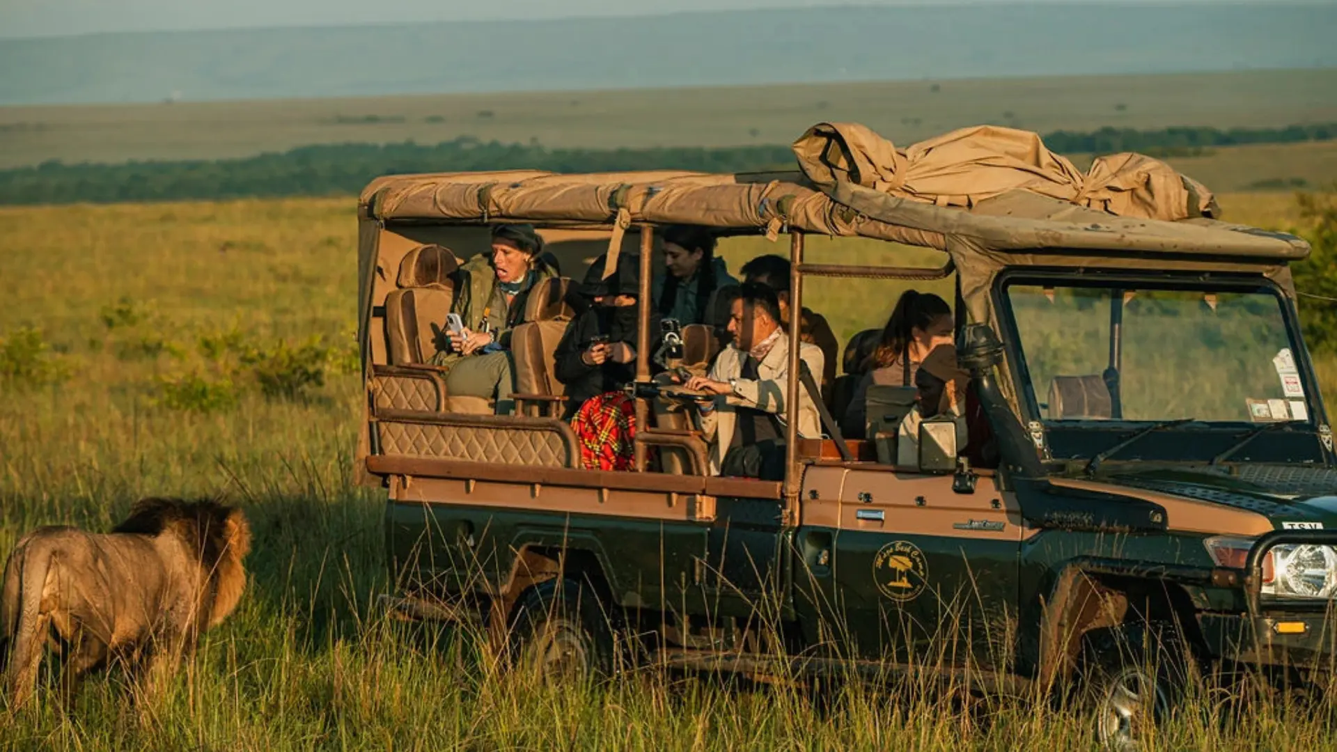 Elephants crossing the Kenyan savannah on safari